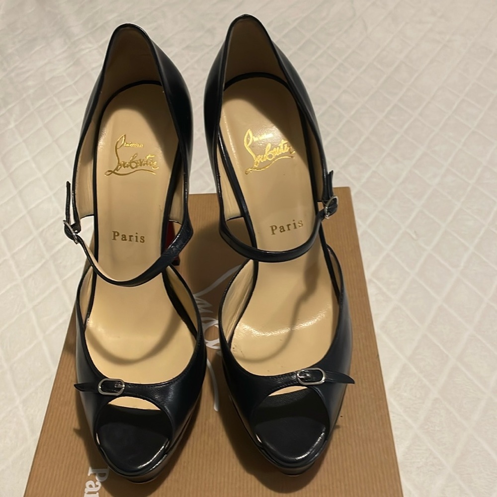 Brand:Christian Louboutin,Paris,Size39(8)col:navy blue,with box,one time worn.